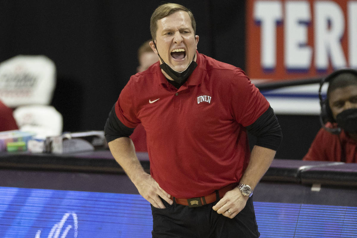 UNLV Rebels head coach T.J. Otzelberger calls an offensive play in the first quarter during an ...