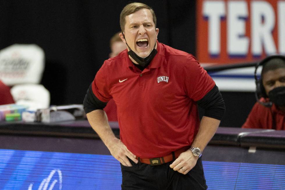 UNLV Rebels head coach T.J. Otzelberger calls an offensive play in the first quarter during an ...