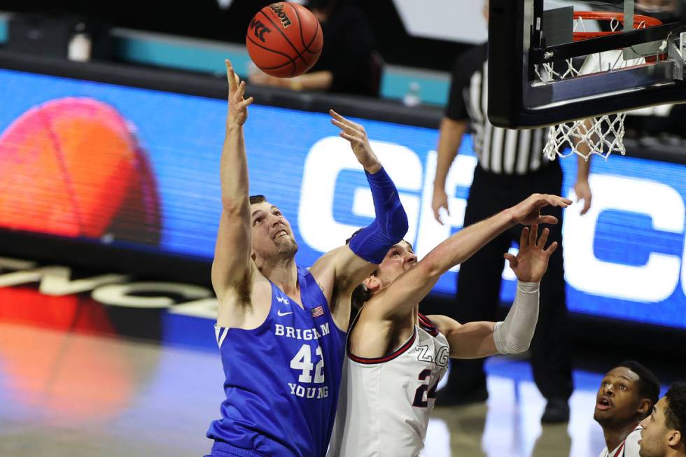 Brigham Young Cougars center Richard Harward (42) leaps for a shot against Gonzaga Bulldogs for ...