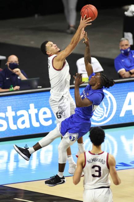 Gonzaga Bulldogs guard Jalen Suggs (1) blocks a shot from Brigham Young Cougars guard Brandon A ...