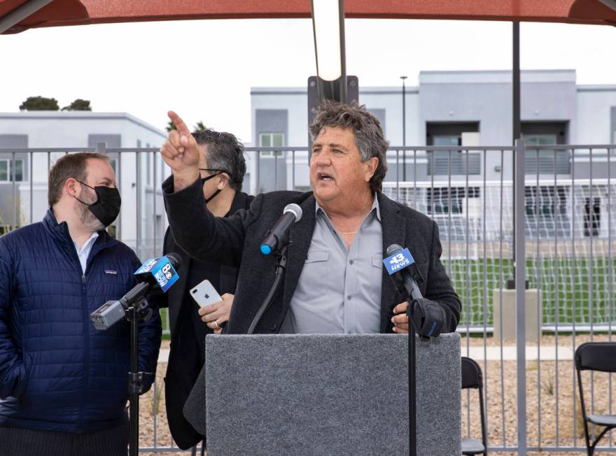 Chi Chi Bengochea, developer of the Showboat Park apartment complex, speaks prior to a ribbon-c ...