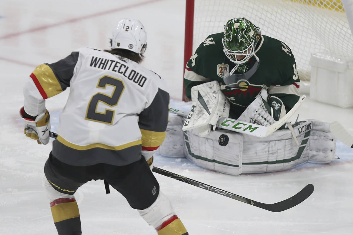 Minnesota Wild's goalie Kaapo Kahkonen (34) stops the puck shot by Vegas Golden Knights' Zach W ...