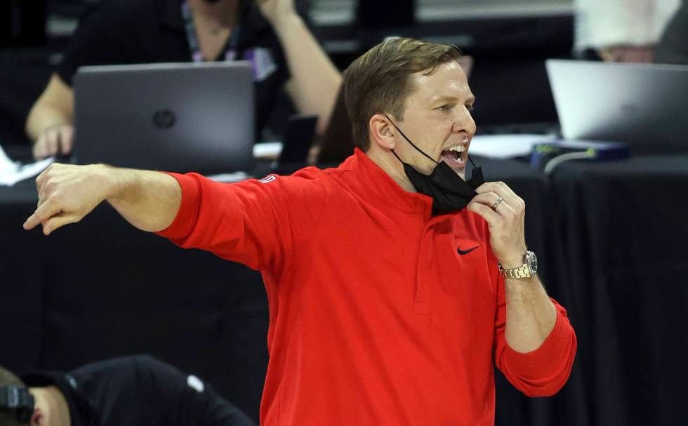 UNLV coach T.J. Otzelberger gestures during the second half of the team's NCAA college basketba ...