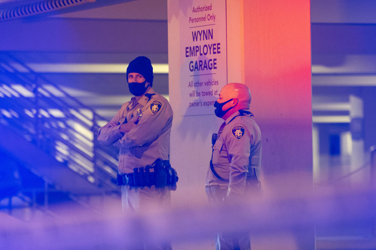 Metropolitan police investigate a homicide at the Wynn Employee Parking Garage on Tuesday, Marc ...