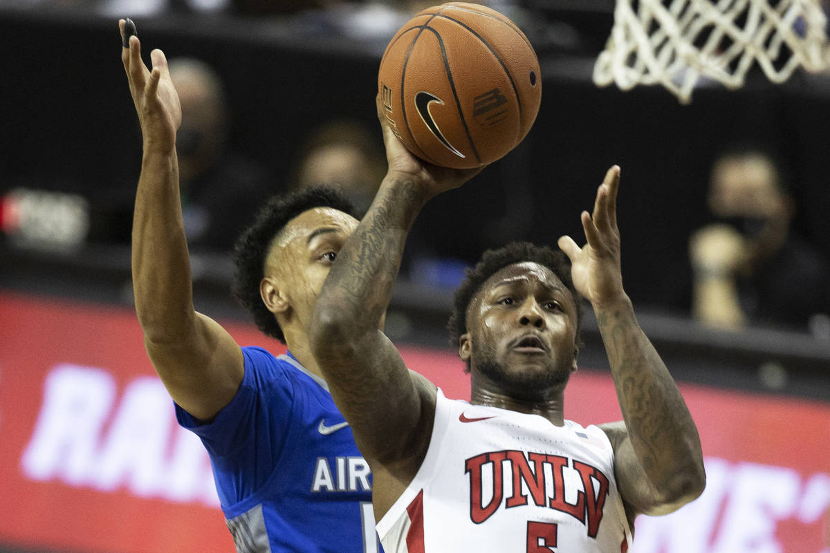 UNLV Rebels guard David Jenkins Jr. (5) shoots over Air Force Falcons guard A.J. Walker (10) in ...