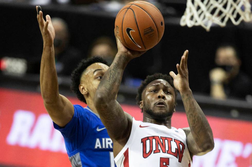 UNLV Rebels guard David Jenkins Jr. (5) shoots over Air Force Falcons guard A.J. Walker (10) in ...