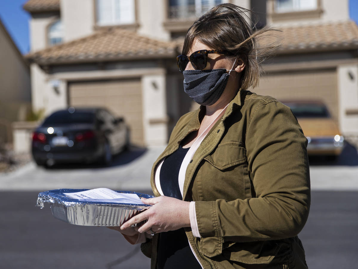 Amy Kelly delivers lasagne to a home in Las Vegas. “I had just been looking for something to ...