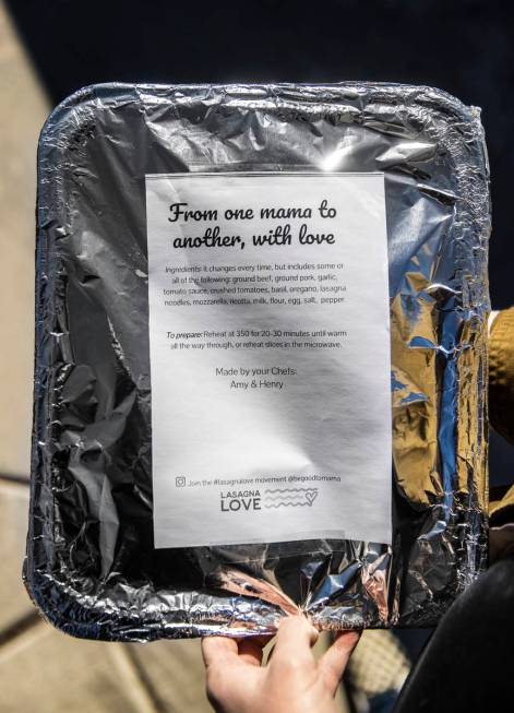 Amy Kelly delivers lasagne to a home in Las Vegas. Lasagne Love is a national program that prov ...