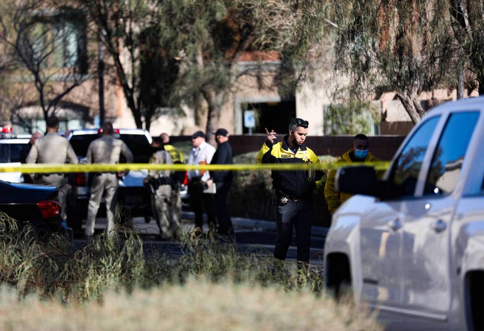 Police investigate the scene of a homicide on the 3900 block of West Cheyenne Avenue on Tuesday ...