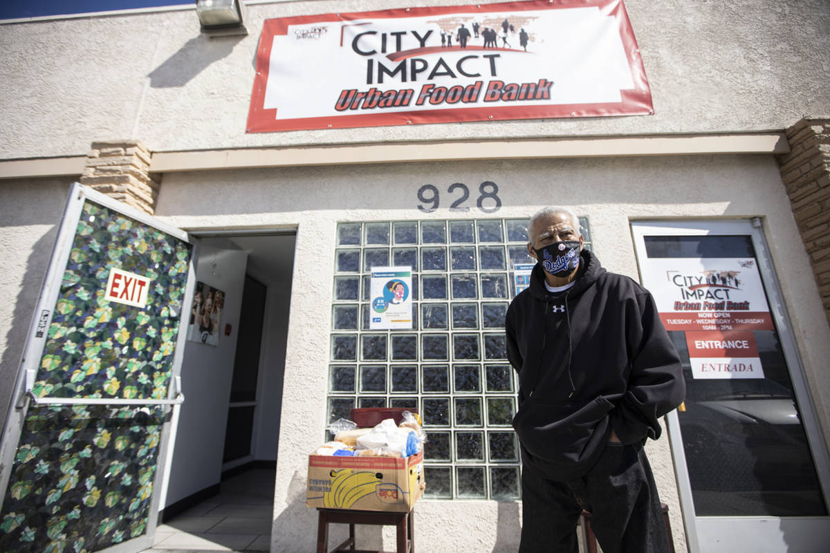 Johnny Hernandez Jr., of Las Vegas, stands outside of the City Impact Urban Food Bank in Las Ve ...