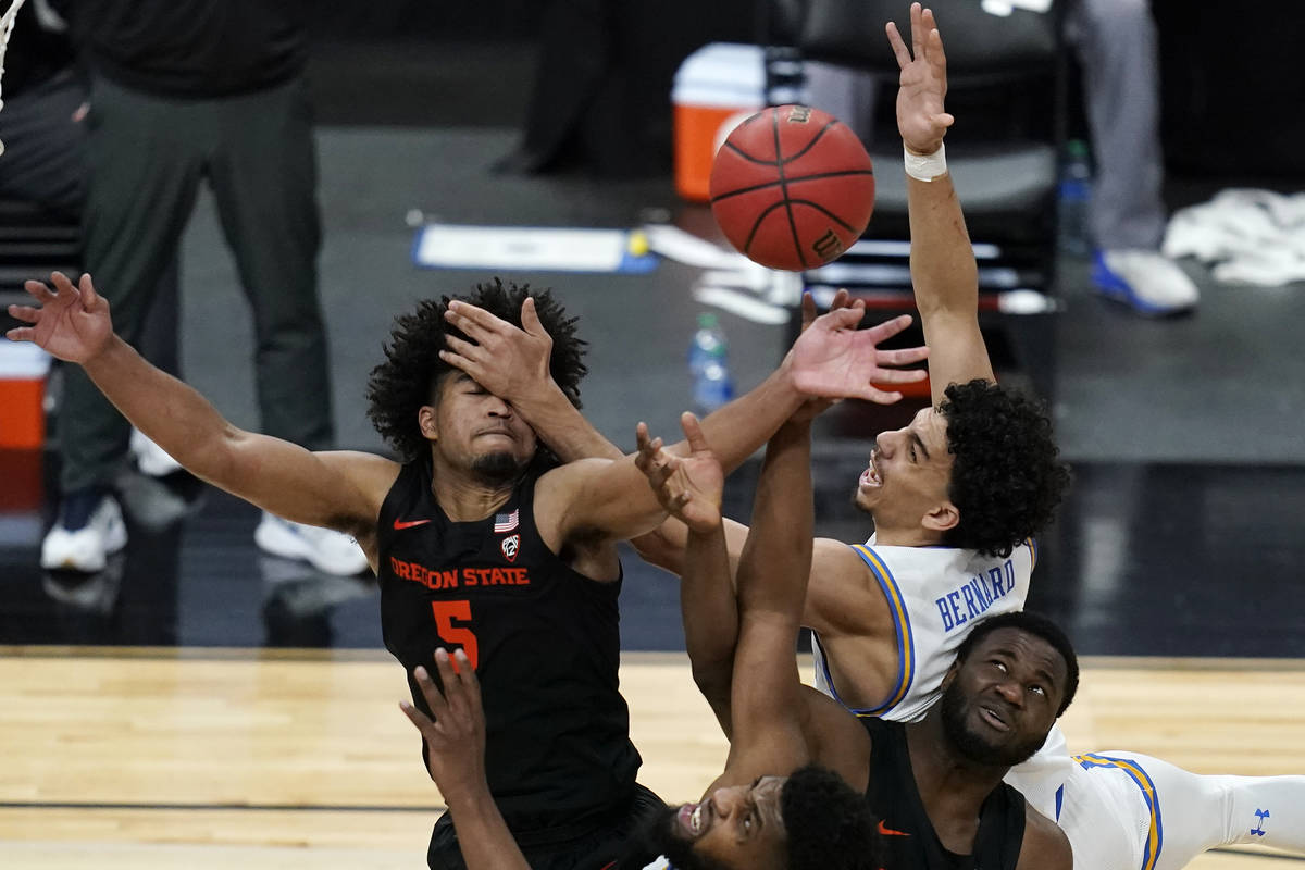 Oregon State's Ethan Thompson, clockwise from top left, UCLA's Jules Bernard, Oregon State's Ro ...
