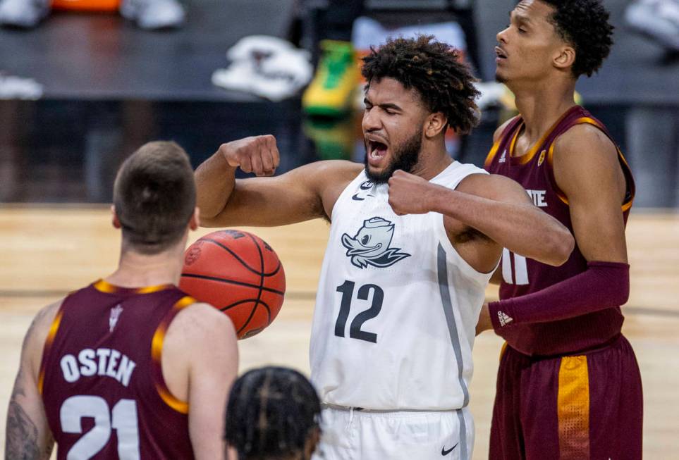 Oregon Ducks guard LJ Figueroa (12) is pumped up after another basket over Arizona State Sun De ...