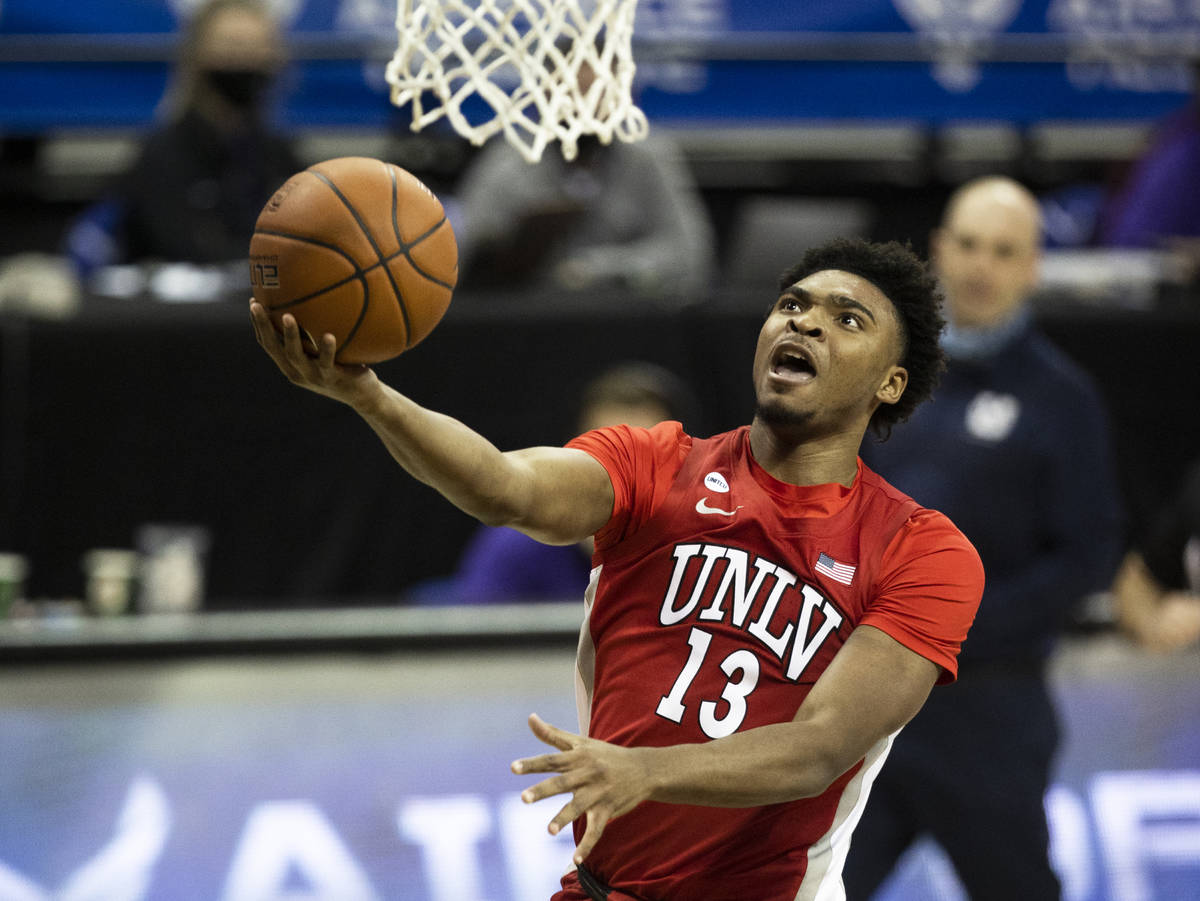UNLV Rebels guard Bryce Hamilton (13) converts a fast break layup in the first half during the ...