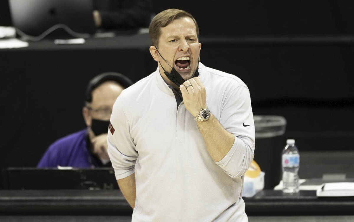 UNLV Rebels head coach T.J. Otzelberger tries to motivate his team in the second half during th ...