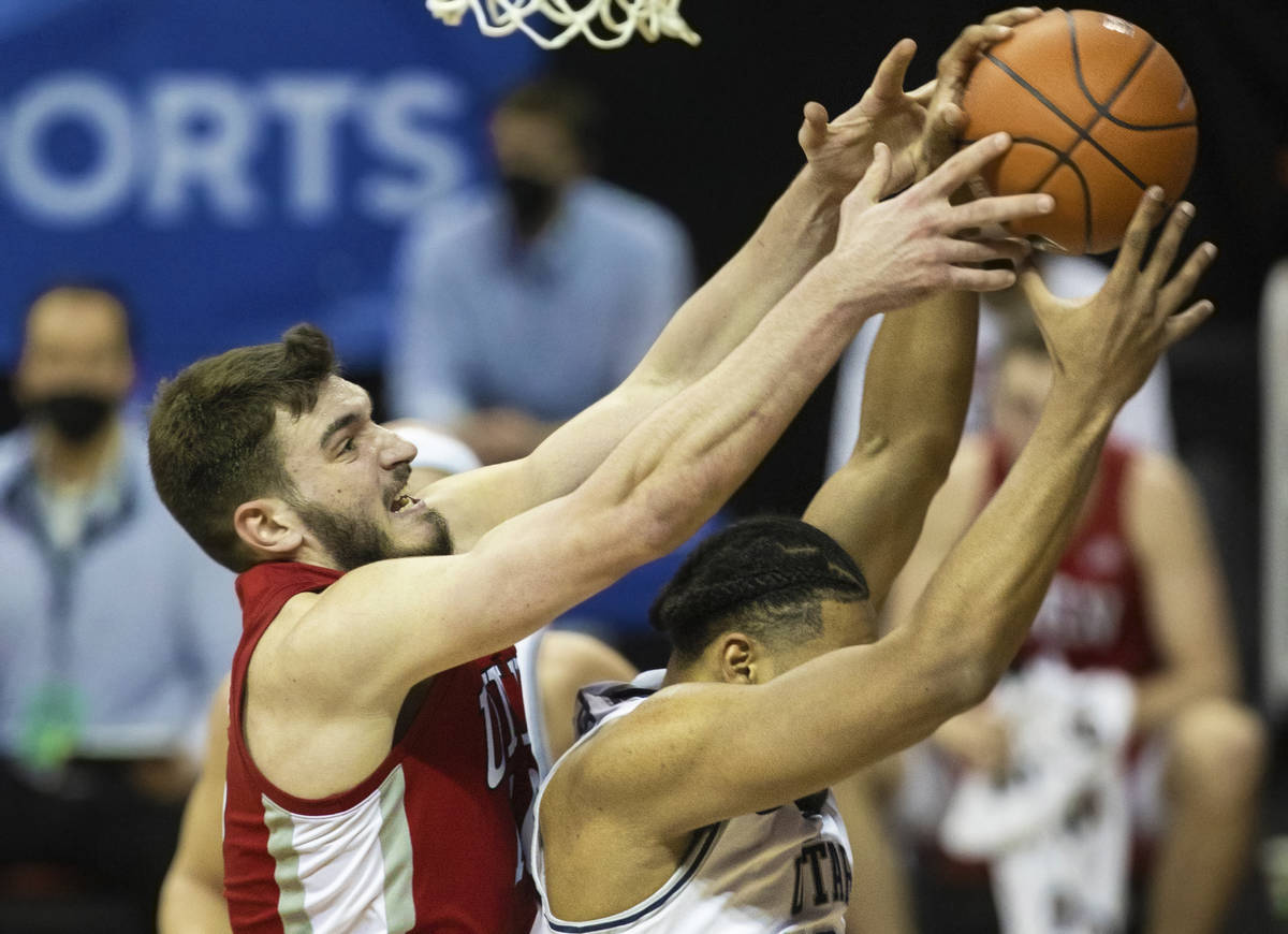 UNLV Rebels forward Edoardo Del Cadia (10) fights for a loose ball with Utah State Aggies forwa ...
