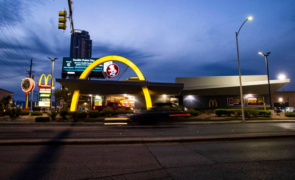 A McDonald's featuring Googie architecture as well as a neon sign of the original mascot, Speed ...