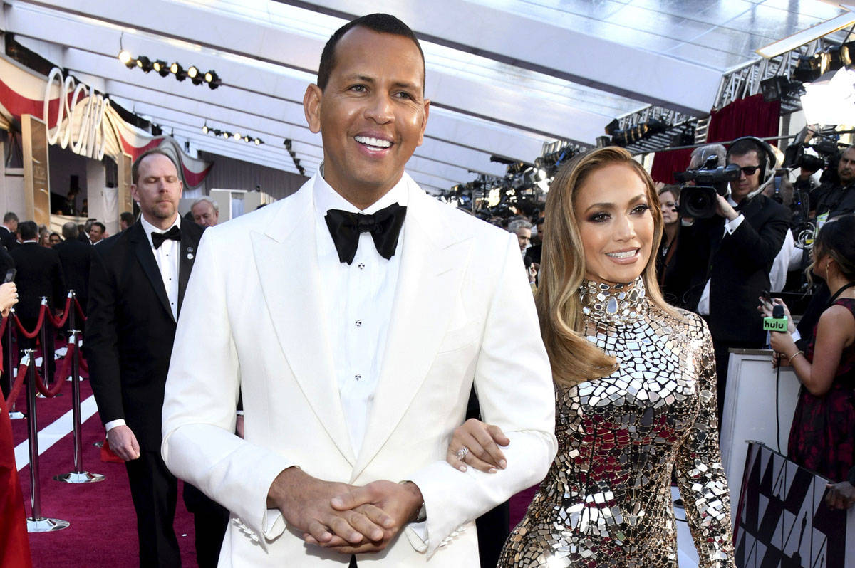 Alex Rodriguez, left, and Jennifer Lopez arrive at the Oscars at the Dolby Theatre in Los Angel ...
