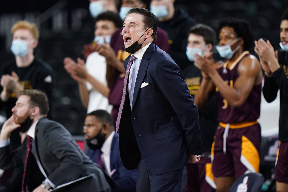 Iona head coach Rick Pitino yells to his team in the first half of an NCAA college basketball g ...