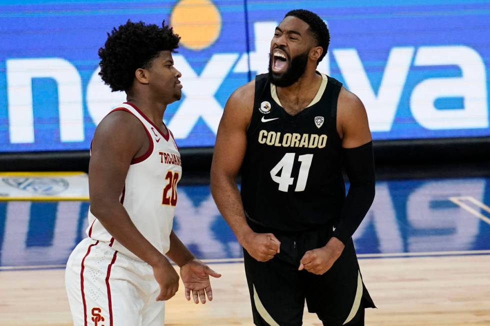 Colorado's Jeriah Horne (41) celebrates after a play beside Southern California's Ethan Anderso ...