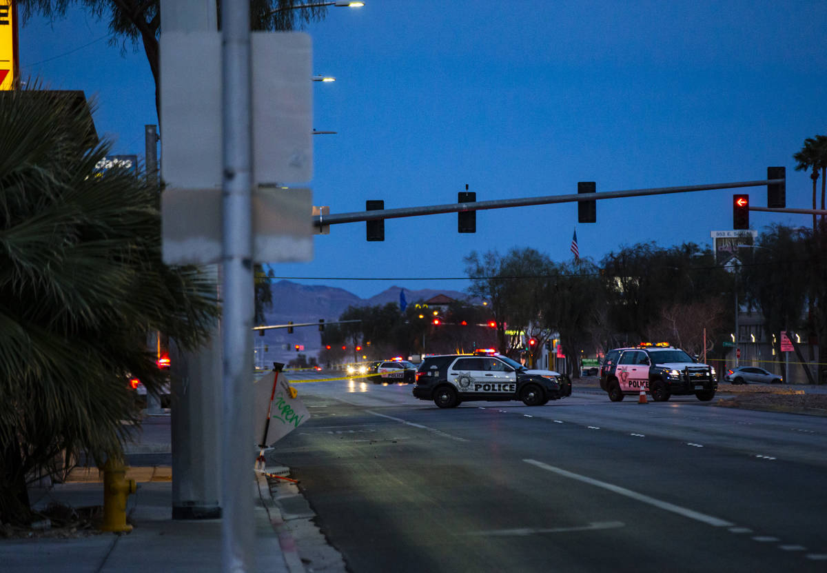 Las Vegas police redirect traffic near the scene of a fatal hit-and-run on Sahara Avenue near 6 ...