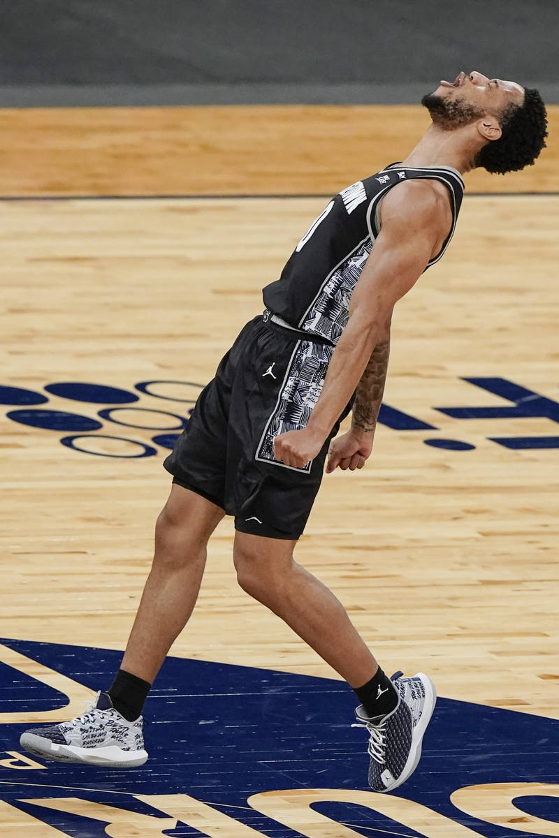 Georgetown's Jahvon Blair (0) celebrates after making a three point basket during the first hal ...