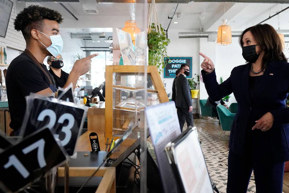 Vice President Kamala Harris gives her order to Germaine Turnbow, while stopping for lunch at T ...