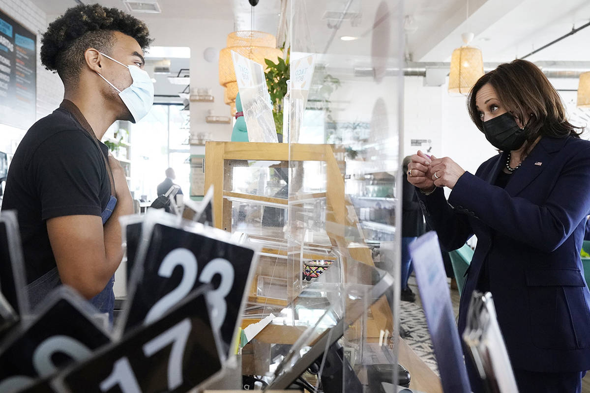 Vice President Kamala Harris gives her order to Germaine Turnbow, while stopping for lunch at T ...