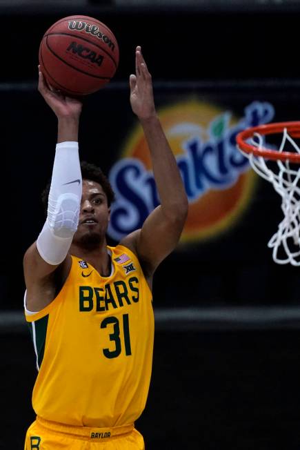 Baylor's MaCio Teague shots during the second half of an NCAA college basketball game against O ...