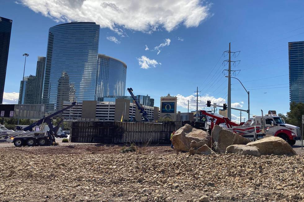 Crews work on an overturned semitractor-trailer Monday, March 15, 2021, on the eastbound Flamin ...