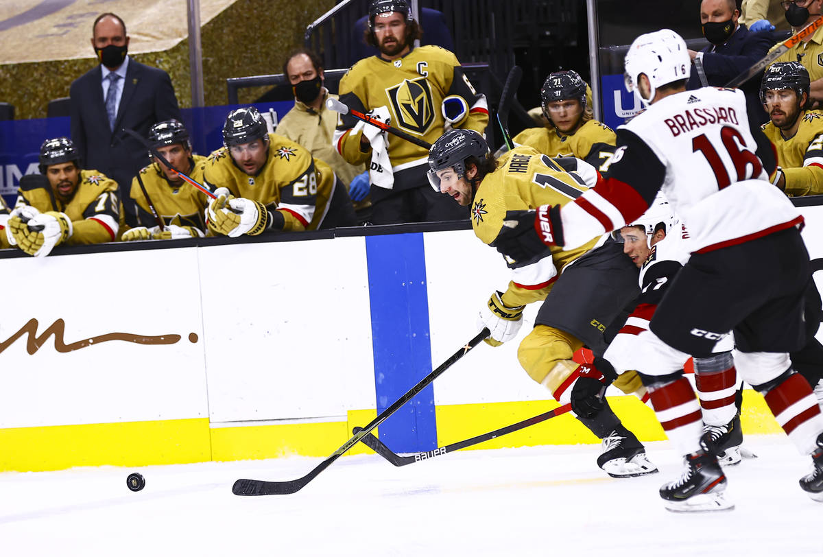 Golden Knights defenseman Nicolas Hague (14) skates with the puck during the second period of a ...