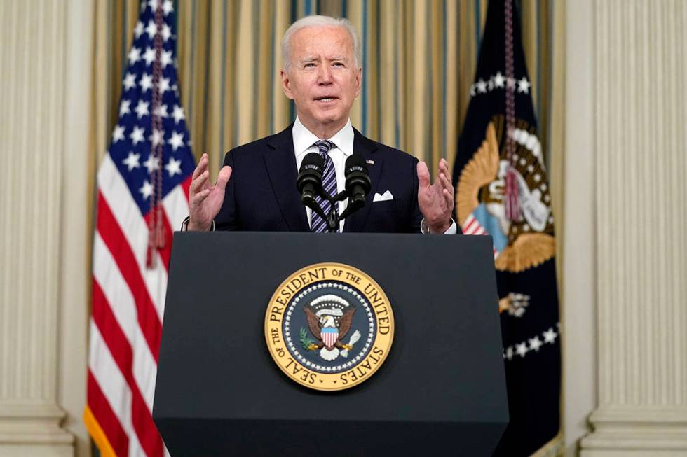 President Joe Biden speaks about the COVID-19 relief package in the State Dining Room of the Wh ...