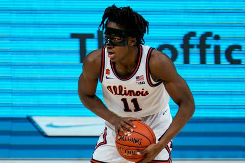 Illinois guard Ayo Dosunmu (11) plays against Ohio State during the second half of an NCAA coll ...