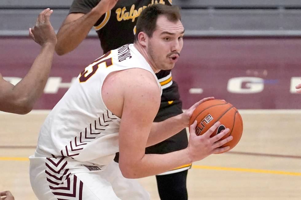 Loyola Chicago's Cameron Krutwig looks to pass during the second half of an NCAA college basket ...