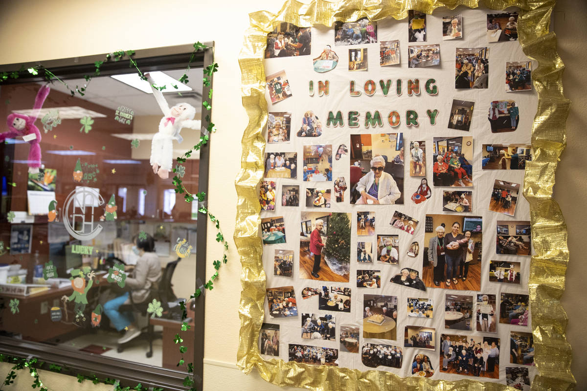 Pictures on a wall remember a former member of the Nevada Adult Daycare Health Center in Las Ve ...