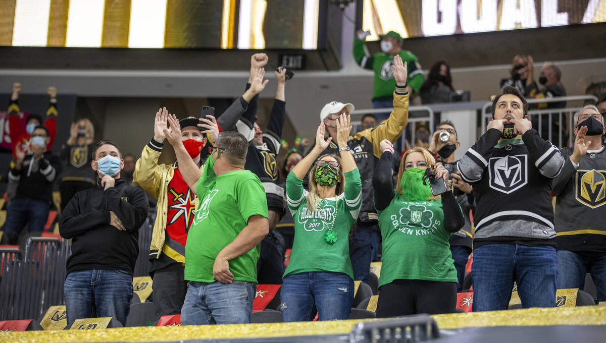 VGK fans celebrate their first goal over the night versus the San Jose Sharks during the first ...