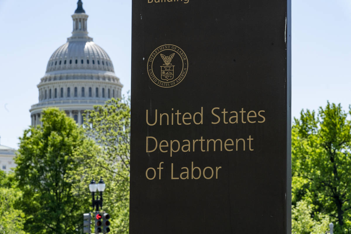 In this May 7, 2020, file photo, the entrance to the Labor Department is seen near the Capitol ...