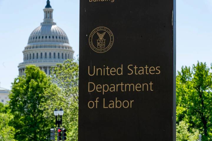 In this May 7, 2020, file photo, the entrance to the Labor Department is seen near the Capitol ...