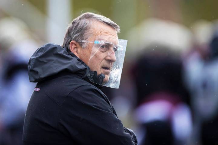 Faith Lutheran head football coach Mike Sanford leads practice on Thursday, March 11, 2021, at ...