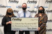 Tyler Corder, CFO of Findlay Automotive, is flanked by Melissa Cipriano, left, executive direct ...