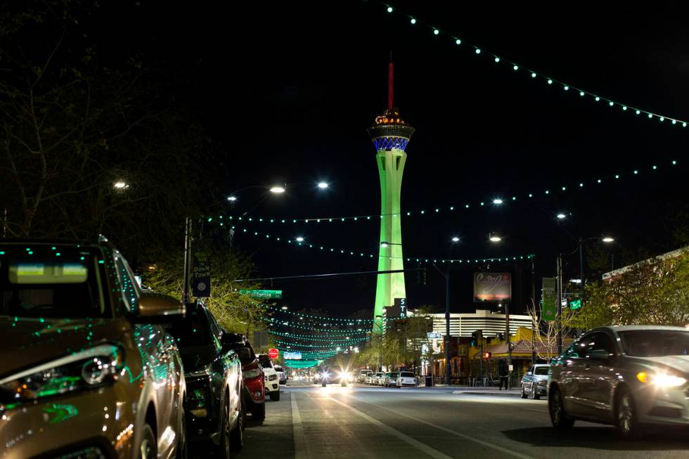The STRAT is lit green for St. Patrick's Day as seen from Main Street in the Arts District on W ...