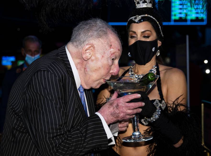 Former Las Vegas Mayor Oscar Goodman sips his martini before placing his March Madness wage a ...