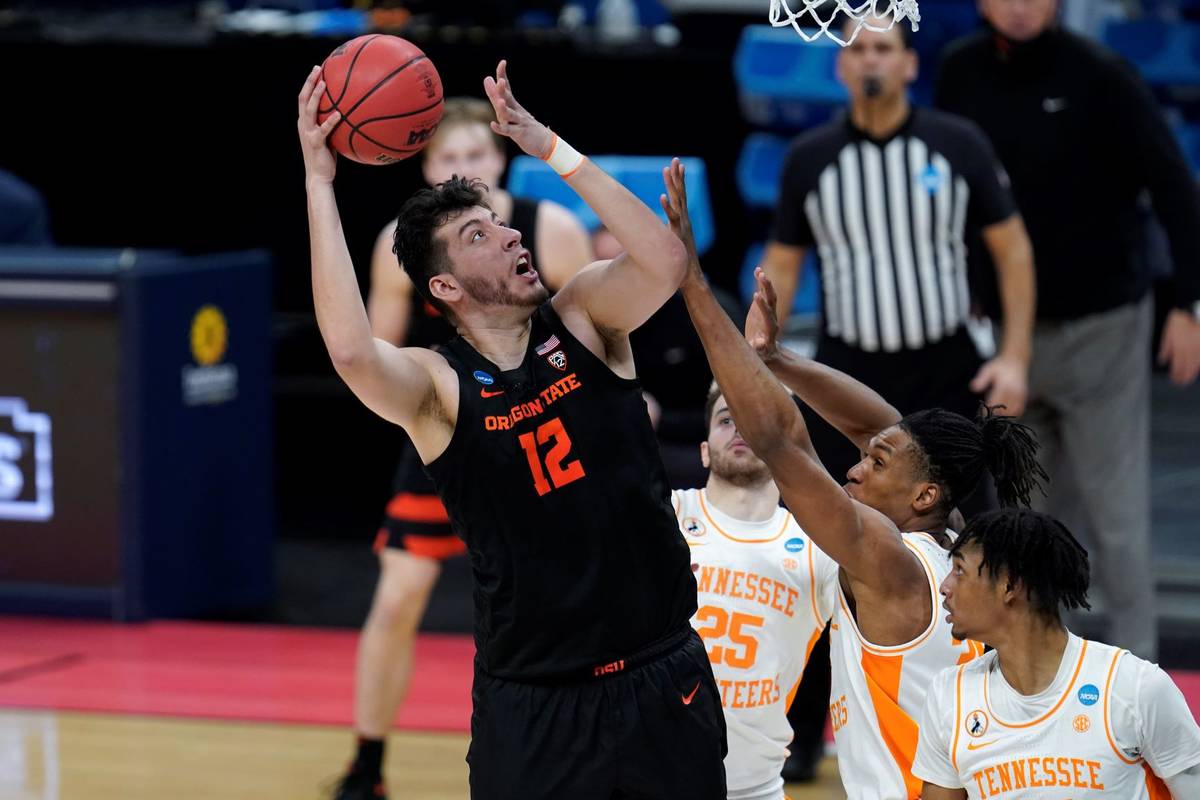 Oregon State center Roman Silva (12) shoots against Tennessee during the second half of a men's ...