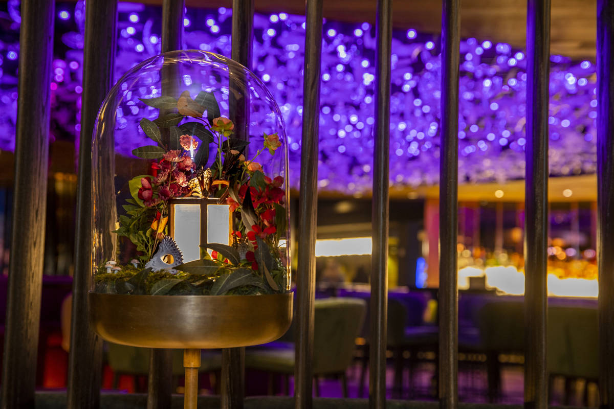 Domed glass art pieces such as this one dot the dining room at One Steakhouse at Virgin Hotels ...