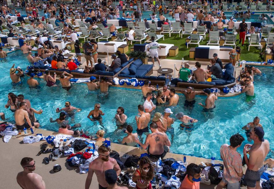 The pools and decks are crowded in Stadium Swim at the Circa on Friday, March 19, 2021. (L.E. ...