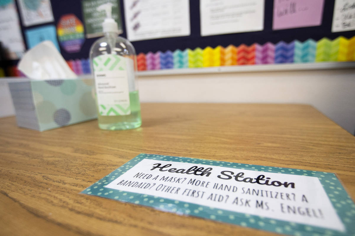A health station is in place in a classroom to follow COVID-19 guidelines at Valley High School ...