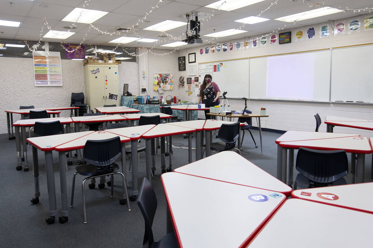 A classroom is set up under the Clark County School District's "hybrid instructional model ...