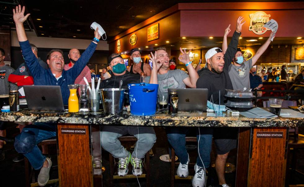 (From left) D.J. Langer, Chris Blake, Auggie Barnes and Brian Murca of Phoenix react to another ...