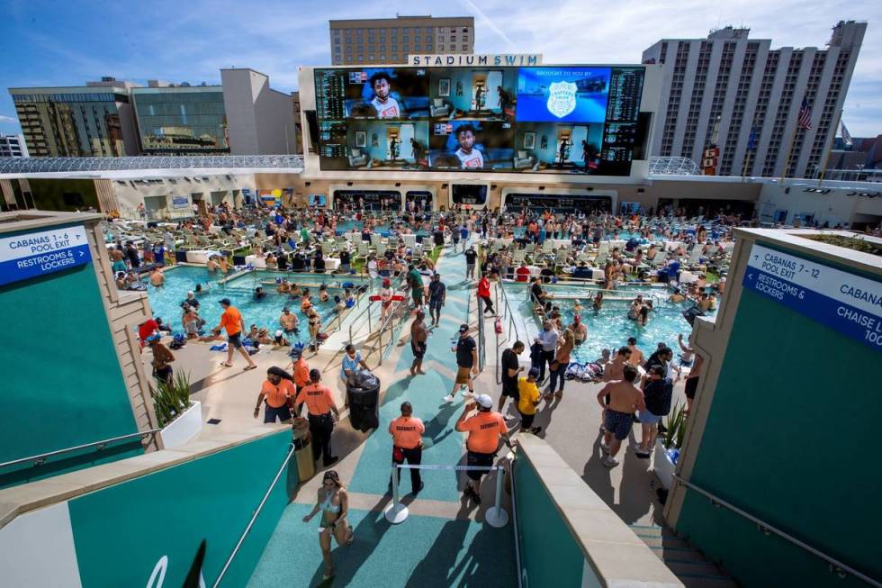 The pools and decks are crowded in Stadium Swim at the Circa on Friday, March 19, 2021. (L.E. B ...