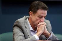 FILE - In this June 15, 2017, file photo, Louisville basketball coach Rick Pitino listens durin ...