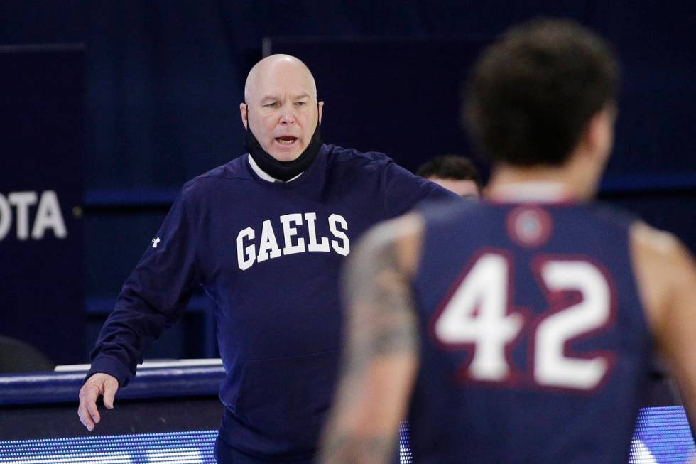 Saint Mary's head coach Randy Bennett directs his players during the second half of an NCAA col ...